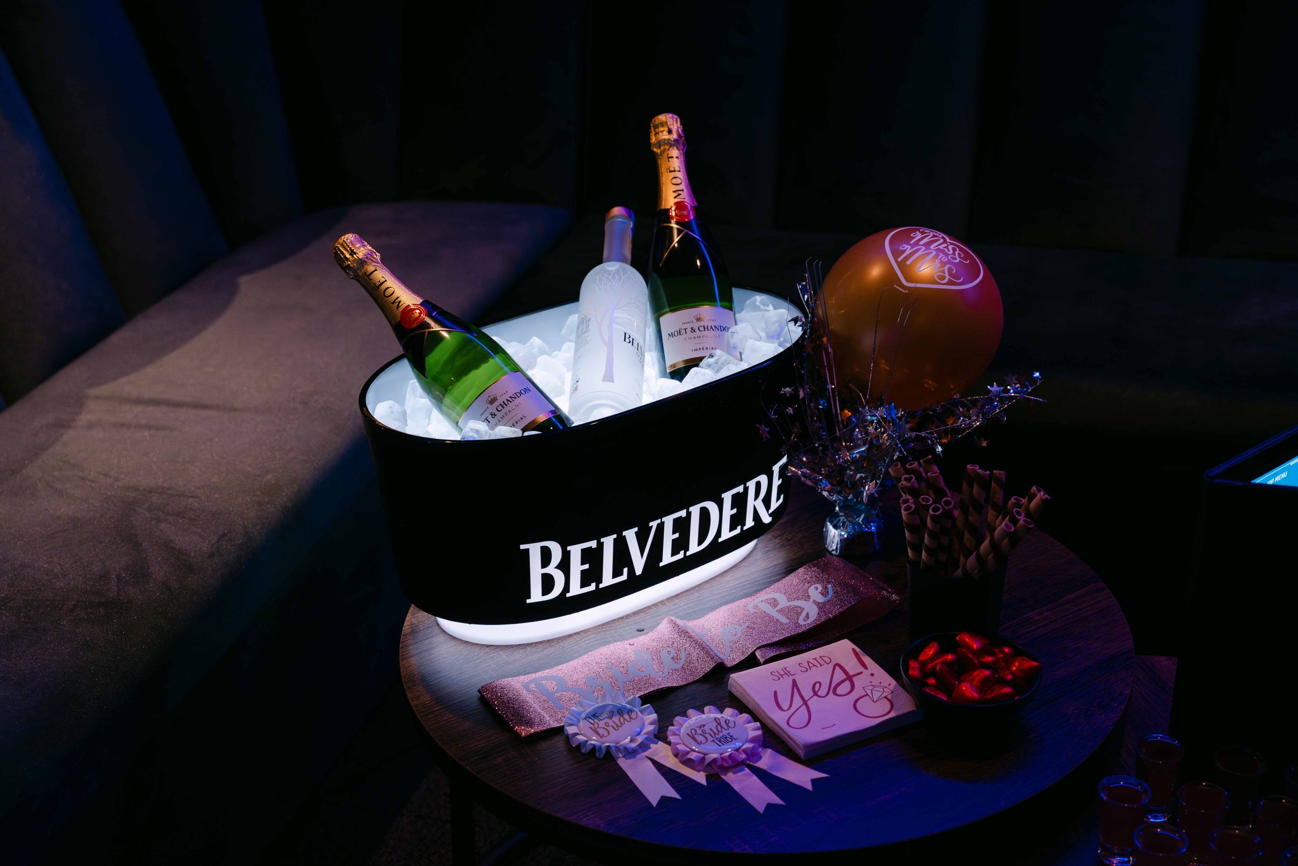 Belvedere drinks setup with ambient blue lighting
